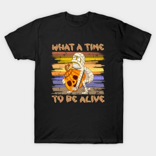 What A Time To Be Alive Halloween Funny Mummy Carrying a Pumpkin T-Shirt